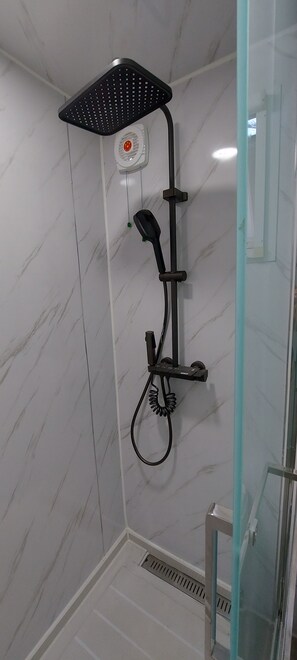 Shower, towels, toilet paper