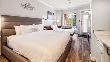 Tabla de planchar con plancha, wifi y ropa de cama