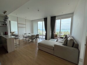 Premium Suite, 2 Bedrooms, Sea View | Living area - Beachfront Bliss at Naiyang by ALPHATEL (Sa Khu)