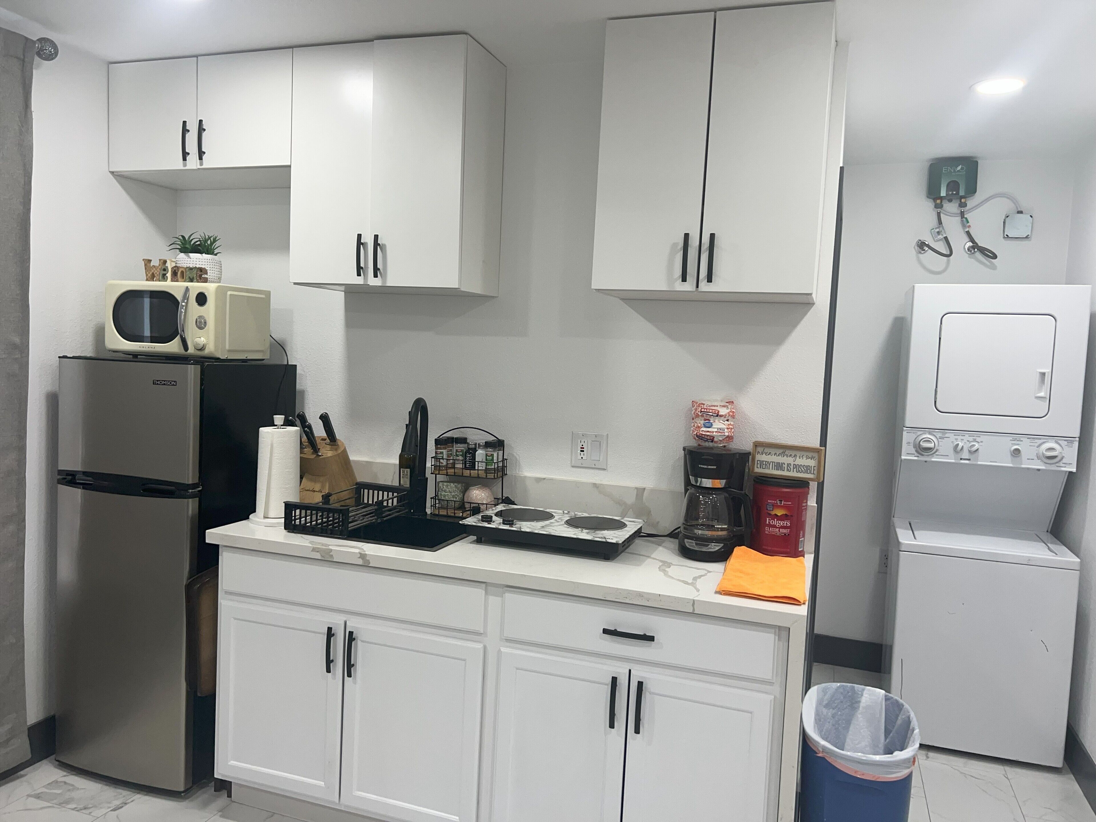 Fridge, microwave, stovetop, coffee/tea maker