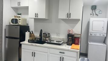 Fridge, microwave, stovetop, coffee/tea maker