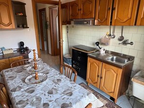 Microwave, stovetop, coffee/tea maker, electric kettle