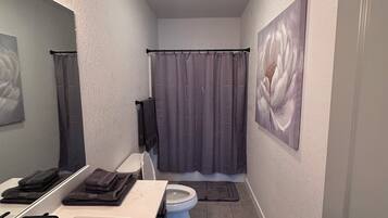 Shower, towels, soap, shampoo