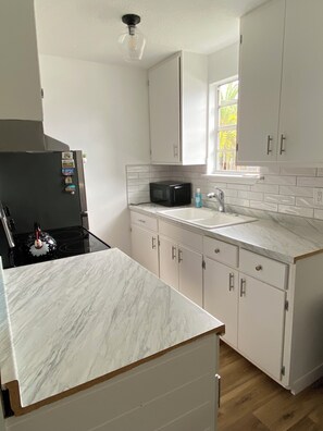 Fridge, coffee/tea maker - Oasis, 1-bedroom Apt.  walk to all of downtown St. Augustine with WiFi, AC (St. Augustine)