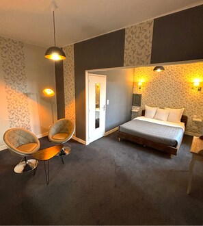 Deluxe Double Room | Desk, laptop workspace, blackout drapes, free WiFi
