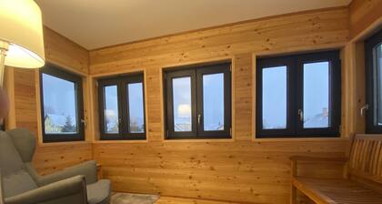 Gemütliche Wohnung in einem Ferienhaus für 12 Gäste mit W-LAN, TV, Terrasse und Parkplatz