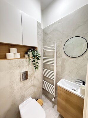 Hair dryer, towels, soap, shampoo