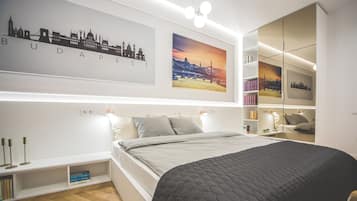 2 habitaciones, tabla de planchar con plancha, cuna de viaje y wifi