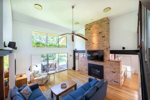 TV, fireplace, books, offices