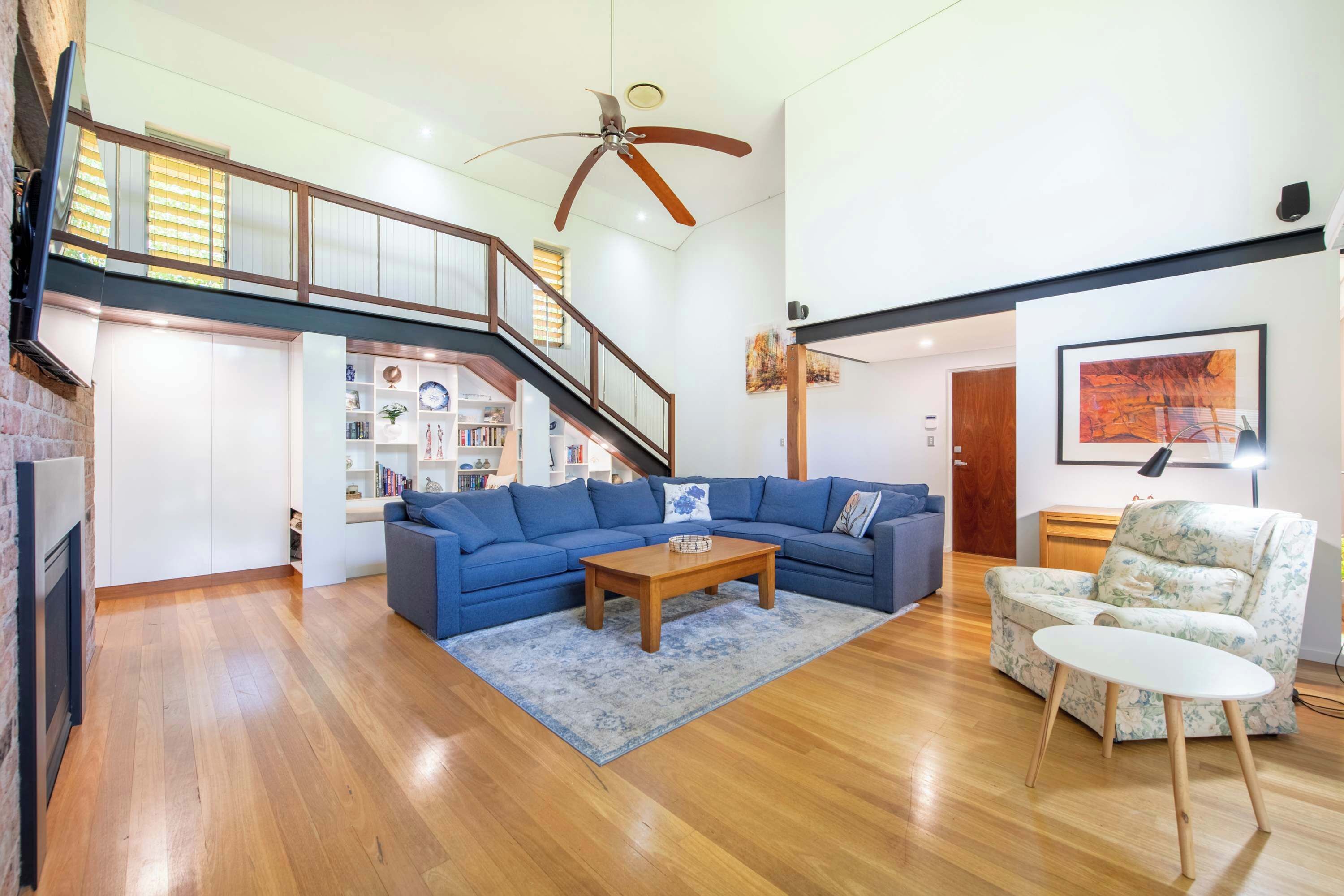 TV, fireplace, books, offices