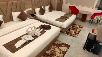 Pillow-top beds, in-room safe, desk, laptop workspace