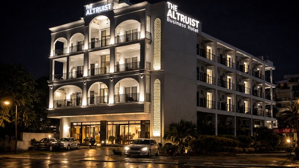 A multi-story hotel with balconies and a sign reading 'The Altruist Business Hotel.' - The Altruist Gurugram Hotel (Gurugram)