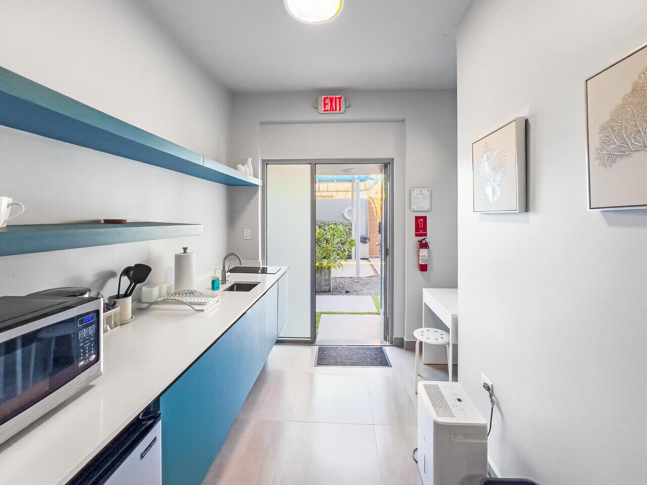 Microwave, stovetop, coffee/tea maker, cookware/dishes/utensils