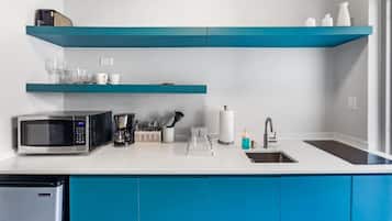 Microwave, stovetop, coffee/tea maker, cookware/dishes/utensils