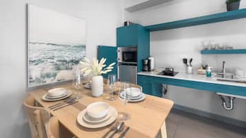 Microwave, stovetop, coffee/tea maker, cookware/dishes/utensils