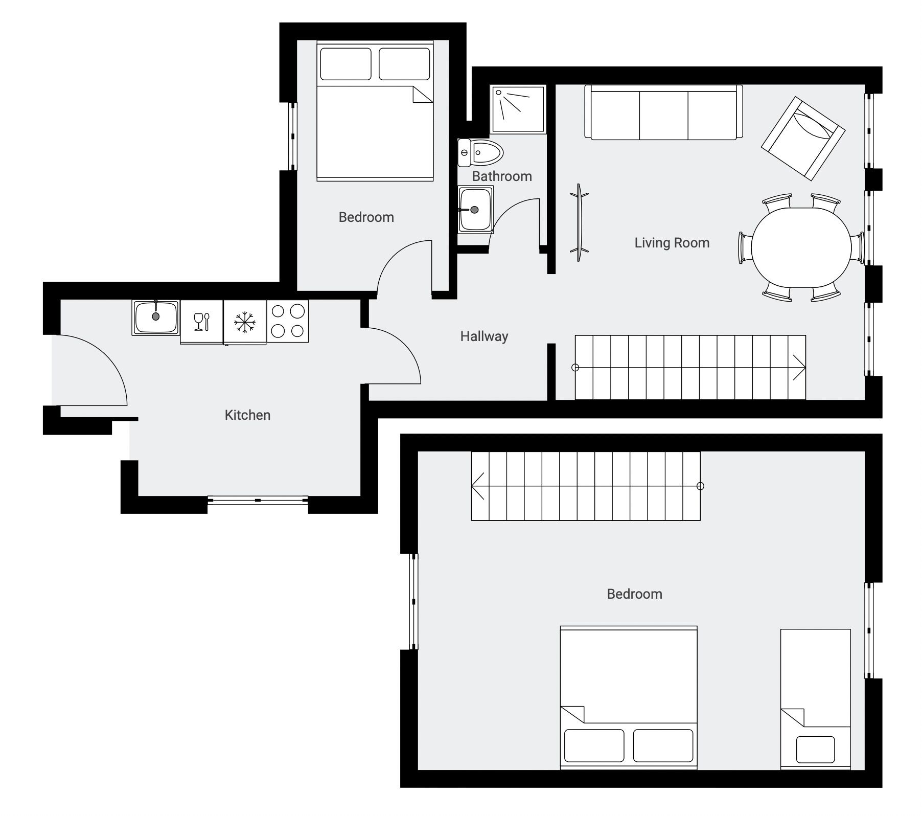 A floor plan with two bedrooms, a kitchen, a bathroom, and a living room.