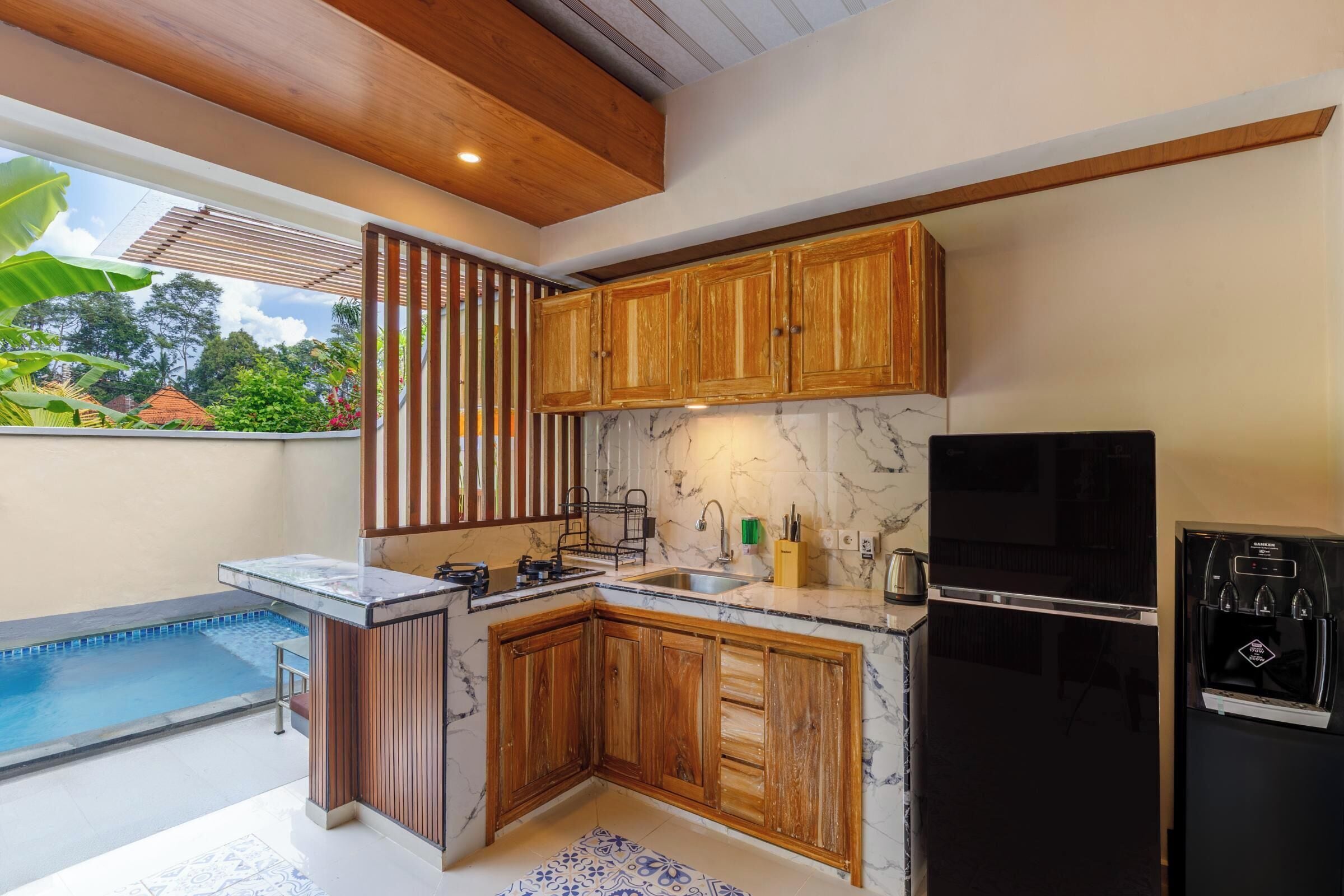 Suite, 1 Bedroom, Non Smoking, Pool View | Private kitchen | Fridge, microwave, stovetop, dishwasher