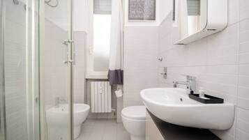 Apartment, City View | Bathroom | Shower, free toiletries, hair dryer, towels