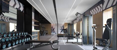 A modern gym with treadmills, dumbbells, and exercise equipment.