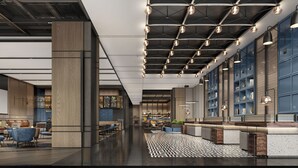 A modern lobby with a high ceiling, exposed beams, and a central seating area with a patterned floor. - Four Points by Sheraton Chengdu, Chunxi Road (Chengdu)