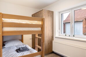 1 室のベッドルーム、WiFi (無料)、ベッドシーツ