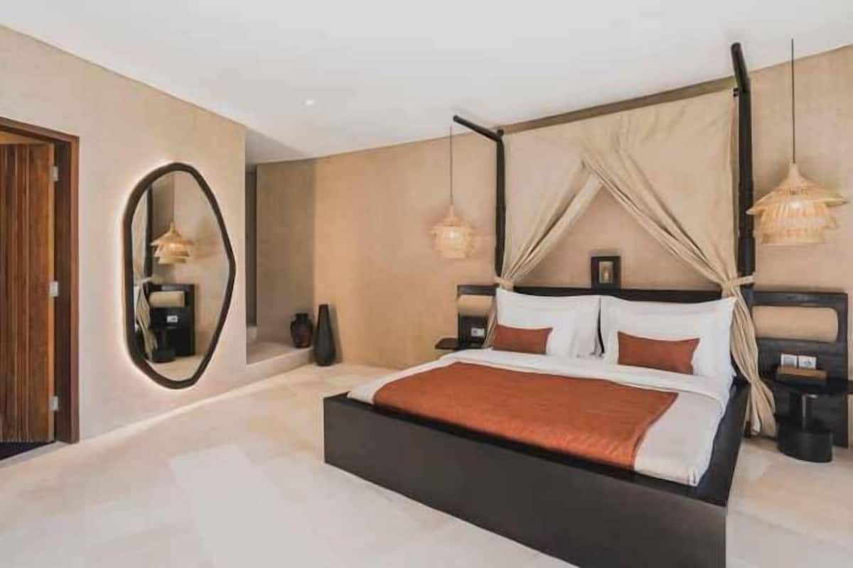 Ropa de cama de alta calidad, minibar y ropa de cama