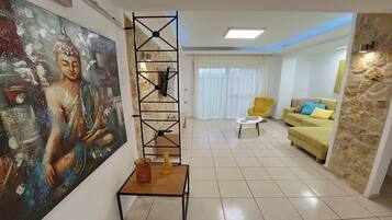 Family Apartment | Living area | 32-inch Smart TV with digital channels