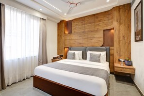 Egyptian cotton sheets, premium bedding, free minibar, in-room safe