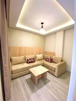 Suite junior | Zona de estar | Televisión de plasma de 42 pulgadas con canales por satélite