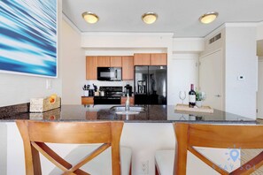 Coffee/tea maker, fridge, microwave, oven