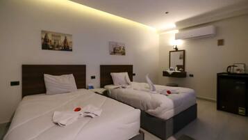 Free minibar, laptop workspace, free WiFi, bed sheets