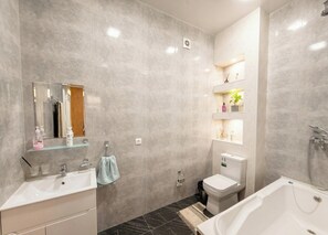 Shower, hair dryer, towels, soap