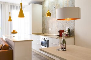 Comfort Apartment, City View | Private kitchen | Full-size fridge, stovetop, dishwasher, espresso maker