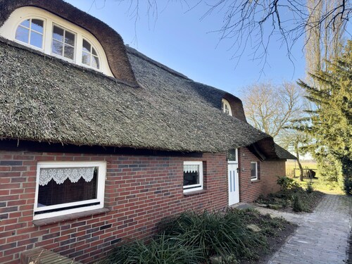 Ferienwohnung im Reetdachhaus, Burhave