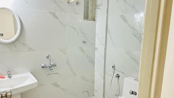 Deluxe Room, City View | Bathroom | Shower, soap, shampoo, toilet paper