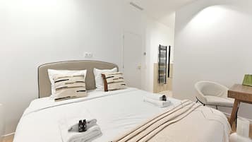 Apartment | Laptop workspace, iron/ironing board, bed sheets