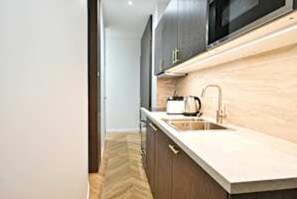 Apartment | Private kitchen | Fridge, microwave, oven, stovetop
