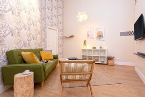 Appartement (1 Bedroom) | Coin séjour | Télévision