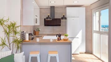 Apartment (2 Bedrooms) | Private kitchen | Fridge, microwave, oven, stovetop