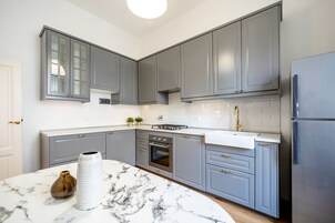 Apartment (2 Bedrooms) | Private kitchen | Fridge, microwave, oven, stovetop