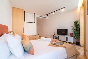Iron/ironing board, travel crib, free WiFi, bed sheets