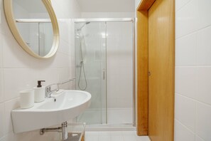 Shower, towels, soap, shampoo