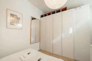 Iron/ironing board, travel crib, free WiFi, bed sheets