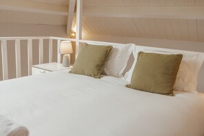 2 dormitorios, tabla de planchar con plancha, wifi gratis y ropa de cama