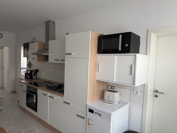 Microones, forn, placa de cuina i rentaplats 