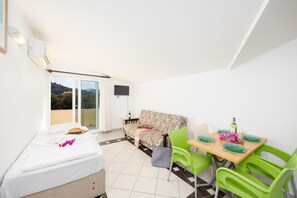 Apartment, 1 Bedroom, Balcony | Living area | 75-cm flat-screen TV with digital channels - Grand Prestige Hotel  (Ortaca)