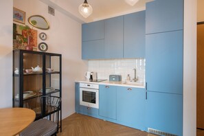 Fridge, microwave, oven, stovetop - GG Home – Stylish 1BR Apartment with Great View (T'bilisi)