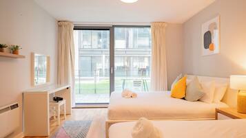 2 bedrooms, desk, iron/ironing board, travel cot