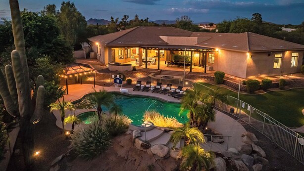 A house with a pool, patio, and cacti. - Private Movie Theater, Luxury Pool, Hot Tub (Scottsdale)