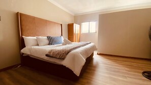 Premium bedding, down duvets, desk, laptop workspace